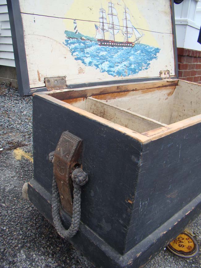 A 19th century sailor-made lift-top seachest circa 1840 with fabulous carved cleats and rope beckets